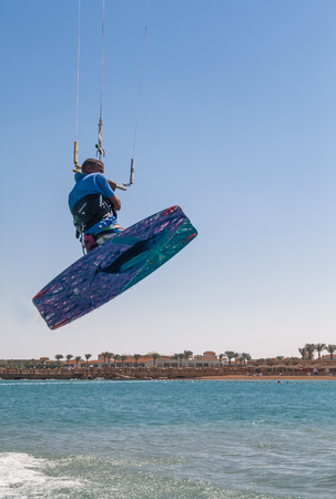 Man jumping on a kiteboard. Man jumping on a kiteboard.