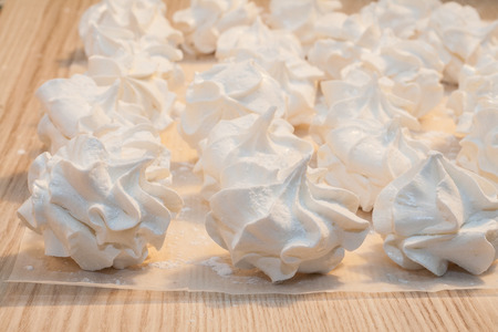 home white marshmallow meringue in retro style.の写真素材