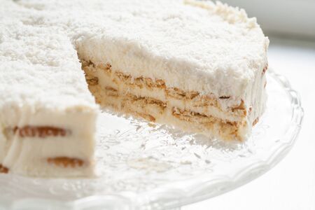 On a piece of coconut cake plate.