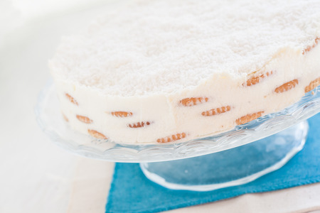 coconut cake pastry on a blue towel.
