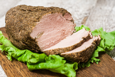 Cold boiled pork in a cut with Salad Leaves.