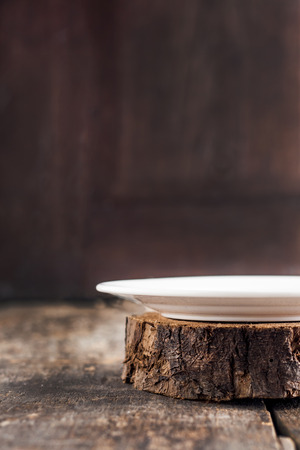 empty plate in the style of Provence on a wooden background.の写真素材