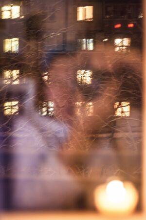 selfie photo camera with reflection in the window.の写真素材