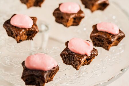 Chocolate cupcakes with pink stars-cream celebratory glass standの写真素材