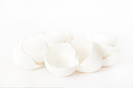 White eggshells on a white background isolated.の写真素材