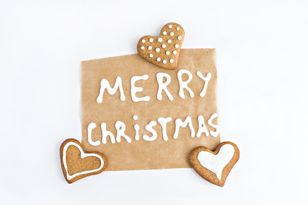 parchment with an inscription and ginger cookies isolated.の写真素材