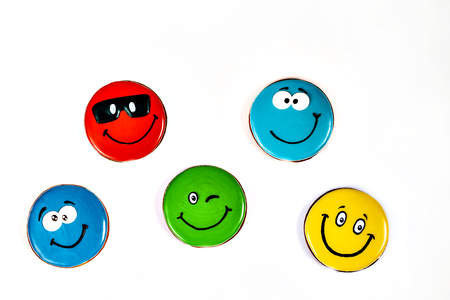 gingerbread painted colorful smilies in different expressions isolated.の写真素材