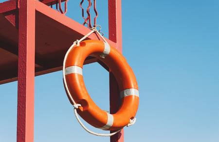 red rescue tower with a lifeline against the blue sky.の写真素材