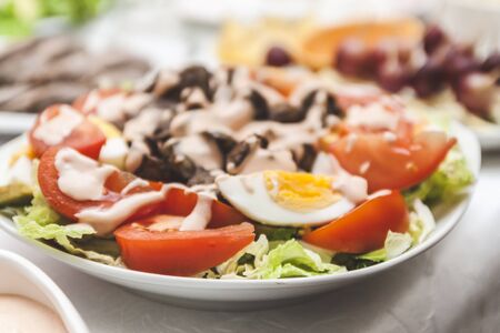 lettuce, tomato, egg and liver sauce closeup.の写真素材