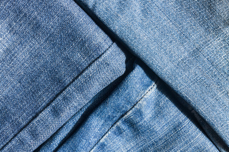 Jeans close-up, texture, torn, mopped piecesの写真素材