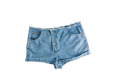 Denim short shorts with torn edge, isolated on white background.の写真素材