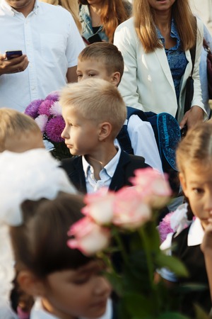 Ukraine.Kiev - September 1, 2016. First-graders and other students on the line near the school.