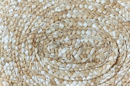 Background of a straw hat, close-up.の写真素材