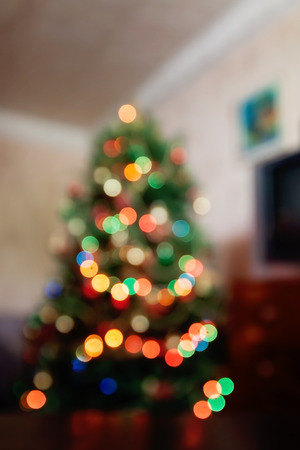 abstract christmas background with defocused lights.の写真素材