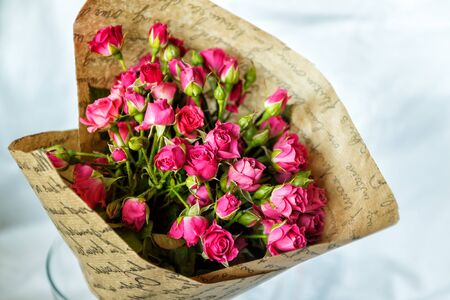 background of the many delicate little pink roses.の写真素材
