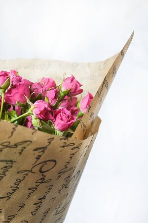 background of the many delicate little pink roses.の写真素材