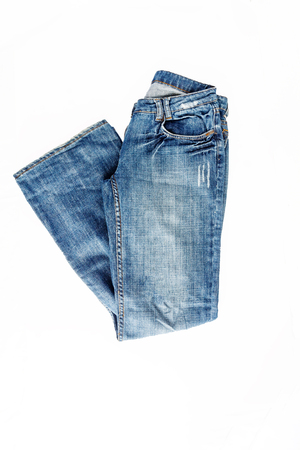 Beautiful casual jeans pants and clothes isolated on white background.の写真素材