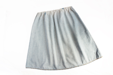 denim light blue worn skirt isolated on white background.の写真素材