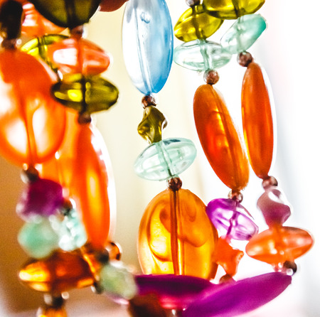 Bright multi-colored glass beads closeup. Blur and abstractionの写真素材