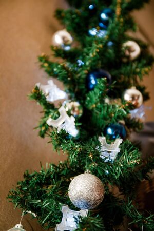 glass ball and decorations on Christmas tree,eiffel tower garlandの写真素材