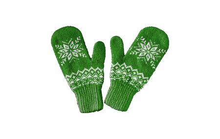 pair of green knitted mittens with christmas pattern isolated on white background. Collage of different mittens.の写真素材