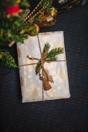 A variety of wrapped gifts under a festively decorated Christmas tree. Life style.の写真素材