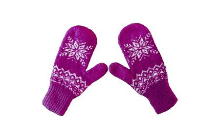 pair of blue and purple knitted mittens with christmas pattern isolated on white background. Collage of different mittens.の写真素材