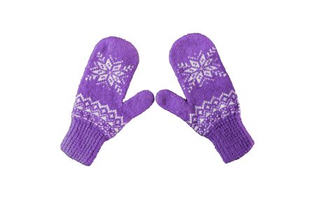 pair of blue and purple knitted mittens with christmas pattern isolated on white background. Collage of different mittens.の写真素材