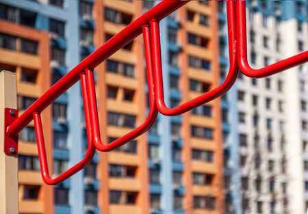 Through the playground, close-up, you can see the high-rise building. Kiev, Ukraine.の写真素材