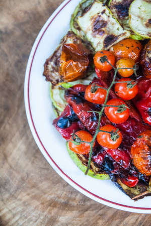 there are a lot of grilled vegetables on the plate.の写真素材