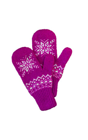 pair of pink lilac purple knitted mittens with christmas pattern isolated on white background. Collage of different mittens.の写真素材