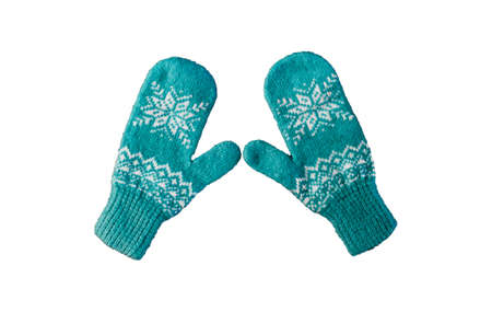 pair of blue knitted mittens with christmas pattern isolated on white background. Collage of different mittens.の写真素材