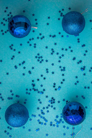 Christmas holidays composition, top view blue-aquamarine Christmas decorations on a green-blue background with copy space for text. Flat lay. Winter, postcard templateの写真素材