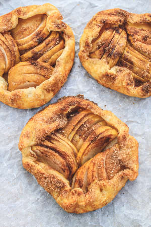 rustic traditional french biscuit cake with apples in autumn style, top viewの写真素材