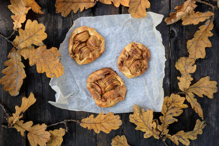 rustic traditional french biscuit cake with apples in autumn style, top viewの写真素材