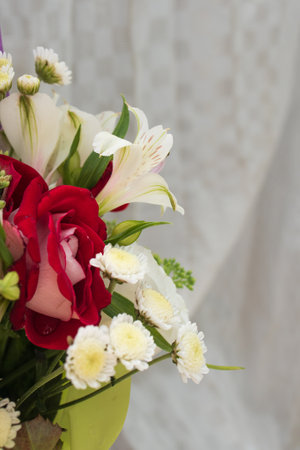 beautiful bright bouquet in a purple basket on a white background, copy spaceの写真素材