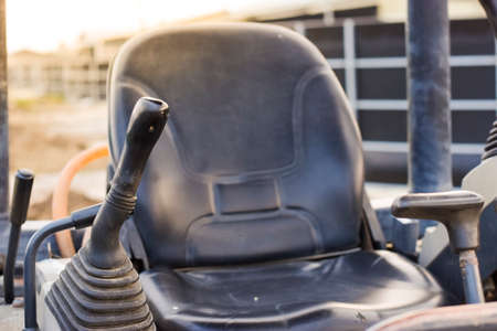 A close-up of the internal backhoe controls for the driver.