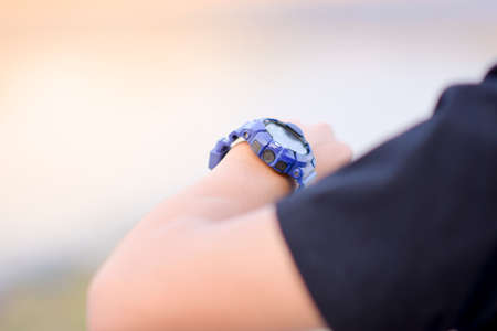 A close up of the clock on the man's arm, Check timeの写真素材