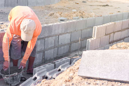 Workers are laying blocks of bricks, Construction work