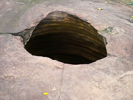 Amazing stone hole the hole is like a pot, is a natural hole.The hole is the largest group in Thailand. There are no less than 16 holes with many sizes ranging from 40 -300 cm wide mouth - 10 m. deepの写真素材