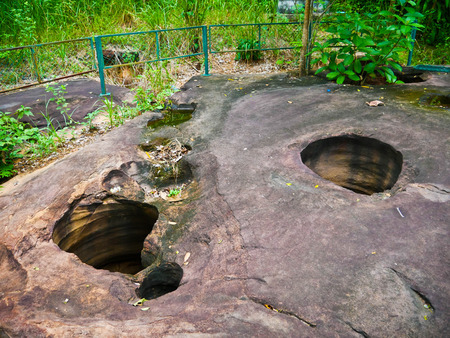 Amazing stone hole the hole is like a pot, is a natural hole.The hole is the largest group in Thailand. There are no less than 16 holes with many sizes ranging from 40 -300 cm wide mouth - 10 m. deepの写真素材