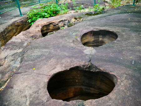 Amazing stone hole the hole is like a pot, is a natural hole.The hole is the largest group in Thailand. There are no less than 16 holes with many sizes ranging from 40 -300 cm wide mouth - 10 m. deepの写真素材
