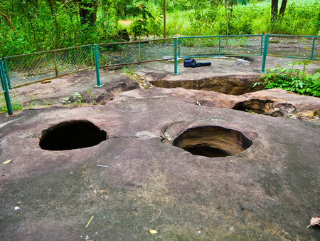 Amazing stone hole the hole is like a pot, is a natural hole.The hole is the largest group in Thailand. There are no less than 16 holes with many sizes ranging from 40 -300 cm wide mouth - 10 m. deepの写真素材