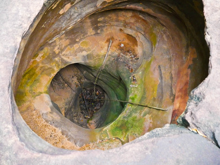 Amazing stone hole the hole is like a pot, is a natural hole.The hole is the largest group in Thailand. There are no less than 16 holes with many sizes ranging from 40 -300 cm wide mouth - 10 m. deepの写真素材