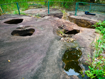 Amazing stone hole the hole is like a pot, is a natural hole.The hole is the largest group in Thailand. There are no less than 16 holes with many sizes ranging from 40 -300 cm wide mouth - 10 m. deepの写真素材