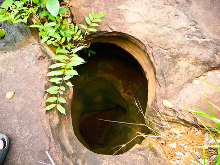 Amazing stone hole the hole is like a pot, is a natural hole.The hole is the largest group in Thailand. There are no less than 16 holes with many sizes ranging from 40 -300 cm wide mouth - 10 m. deepの写真素材