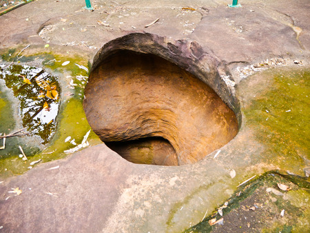 Amazing stone hole the hole is like a pot, is a natural hole.The hole is the largest group in Thailand. There are no less than 16 holes with many sizes ranging from 40 -300 cm wide mouth - 10 m. deepの写真素材