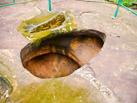 Amazing stone hole the hole is like a pot, is a natural hole.The hole is the largest group in Thailand. There are no less than 16 holes with many sizes ranging from 40 -300 cm wide mouth - 10 m. deepの写真素材