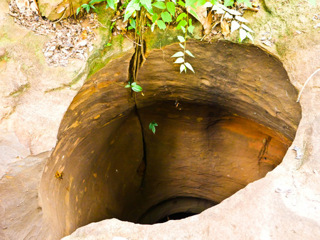 Amazing stone hole the hole is like a pot, is a natural hole.The hole is the largest group in Thailand. There are no less than 16 holes with many sizes ranging from 40 -300 cm wide mouth - 10 m. deepの写真素材