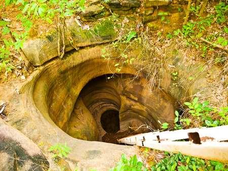 Amazing stone hole the hole is like a pot, is a natural hole.The hole is the largest group in Thailand. There are no less than 16 holes with many sizes ranging from 40 -300 cm wide mouth - 10 m. deepの写真素材